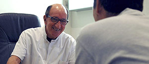 Dr Otmezguine in cancer diagnosis consultation